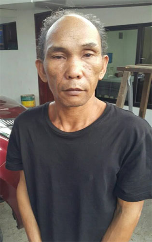 高杉さん殺人事件で、ナボタス市の潜伏先で逮捕されたマグナアン容疑者=国家警察提供