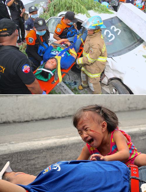 (上)乗客がタクシーの中に閉じ込められた想定で救出訓練を行うMMDAレスキュー隊員ら=22日午前9時半ごろ、首都圏マカティ市グアダルーペ橋で冨田すみれ子写す。(下)負傷者を演じ救出訓練に参加する母親の隣で、倒れた母親の姿に驚き泣く少女=22日午前9時15分ごろ、首都圏マカティ市グアダルーペ橋で冨田すみれ子写す